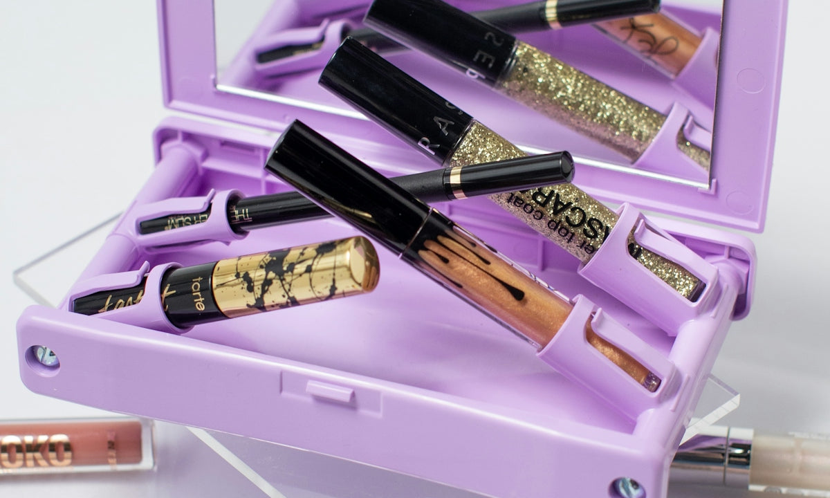 black and purple lipstick in box