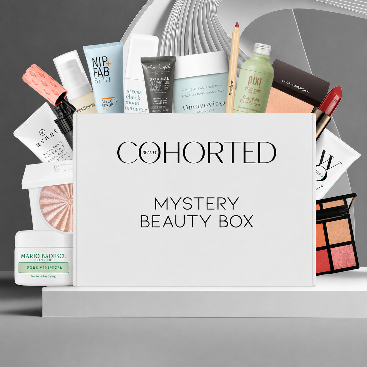Cohorted Mystery Beauty Box gift set with assorted skincare and makeup products inside a branded box.